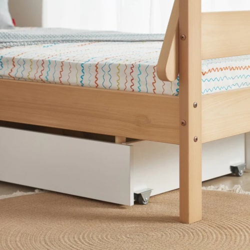 Cot bed with 2025 storage drawer